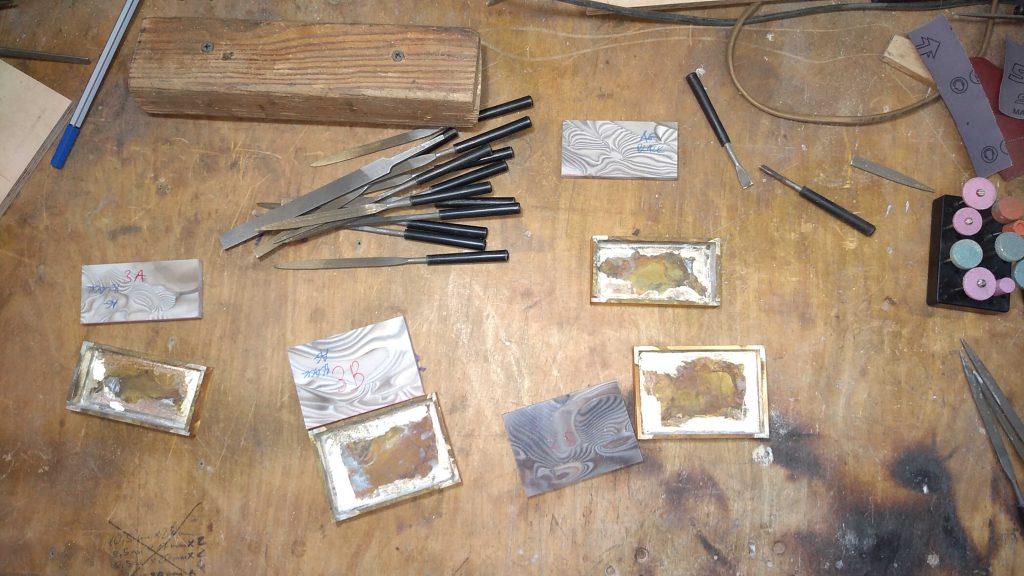 how_we_create_luxurious_belt_buckle_we_hand_grind_interior_of_each_silver_soldered_buckle_to_fit_striped_flint_by_kostylo_atelier silver-soldered brass trouser buckles and fitting of unique striped flints in the Kostylo atelier