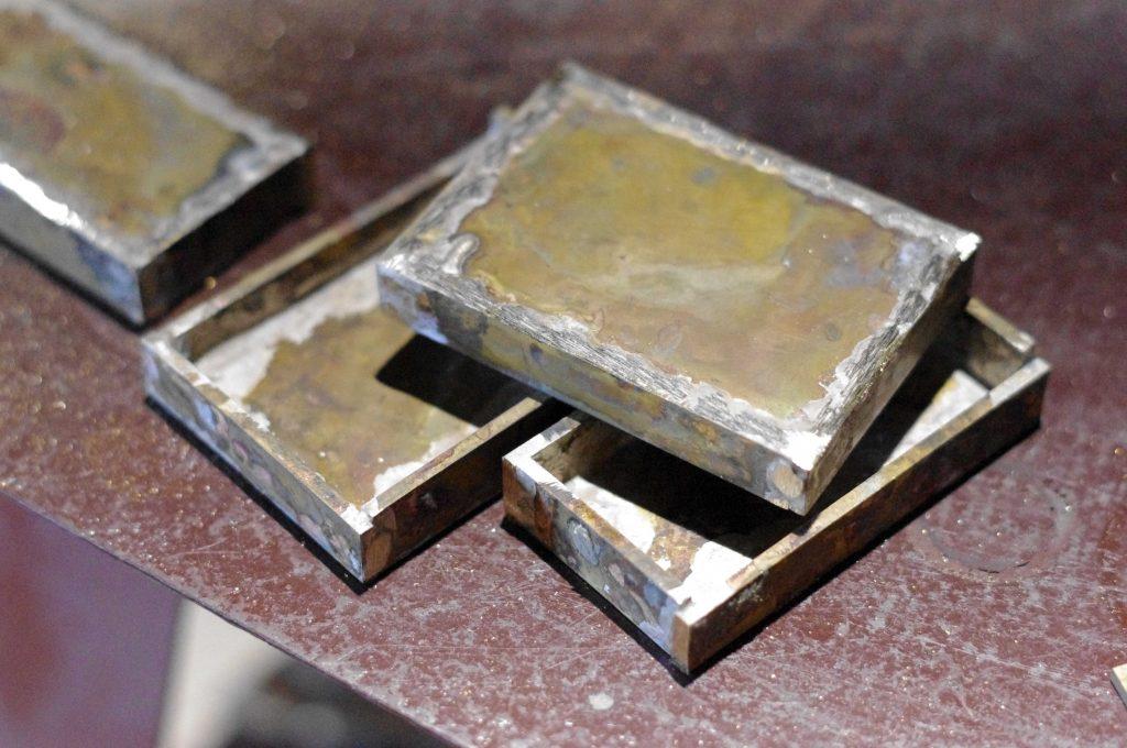 how_we_create_luxurious_trouser_belt_buckle_by_silver_soldering_cut_strips_into_one_whole_in_the atelier Kostylo brass trouser buckles after silver soldering are waiting for manual grinding of excess silver, copper plating and gold plating only in the Kostylo atelier