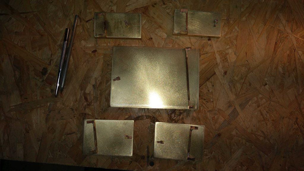 how_we_create_luxury_belt_buckle_hand_silver_soldered_and_hand_grinded_all_in_kostylo_atelier Soldered with silver and pre-grinded brass belt buckles along with components prepared for further silver soldering all handcrafted in the Kostylo atelier