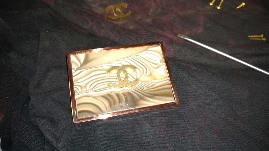 how_we_create_luxury_buckle_copper_plated_buckle_before_gold_plating_in_kostylo_atelier copper-coated and then polished to high gloss trouser buckle before gilding with italian gold in the Kostylo atelier
