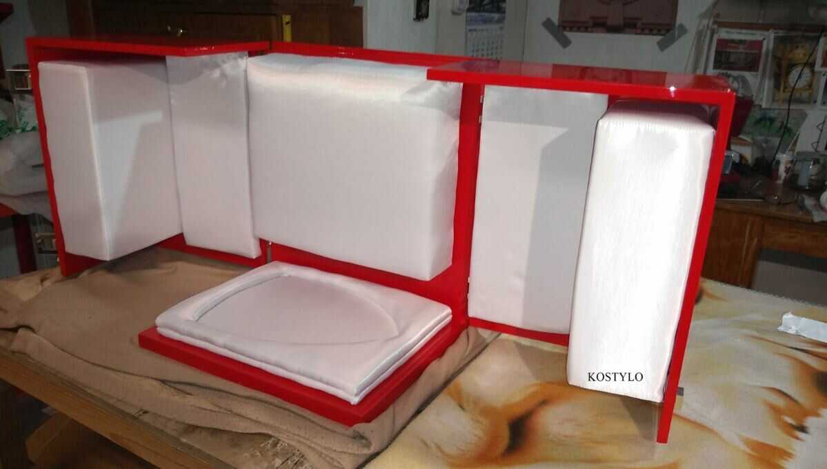how_we_create_luxury_ferrari_horse_figure_crafting_special_red_box_lined_with_white_satin_inside_all_handmade_at_kostylo_atelier in the meantime luxurious red box lined with white satin is being prepared for the luxury Ferrari horse sculpture along with custom-designed luxury silver-plated hinges and clasps for the box, all at the Kostylo atelier