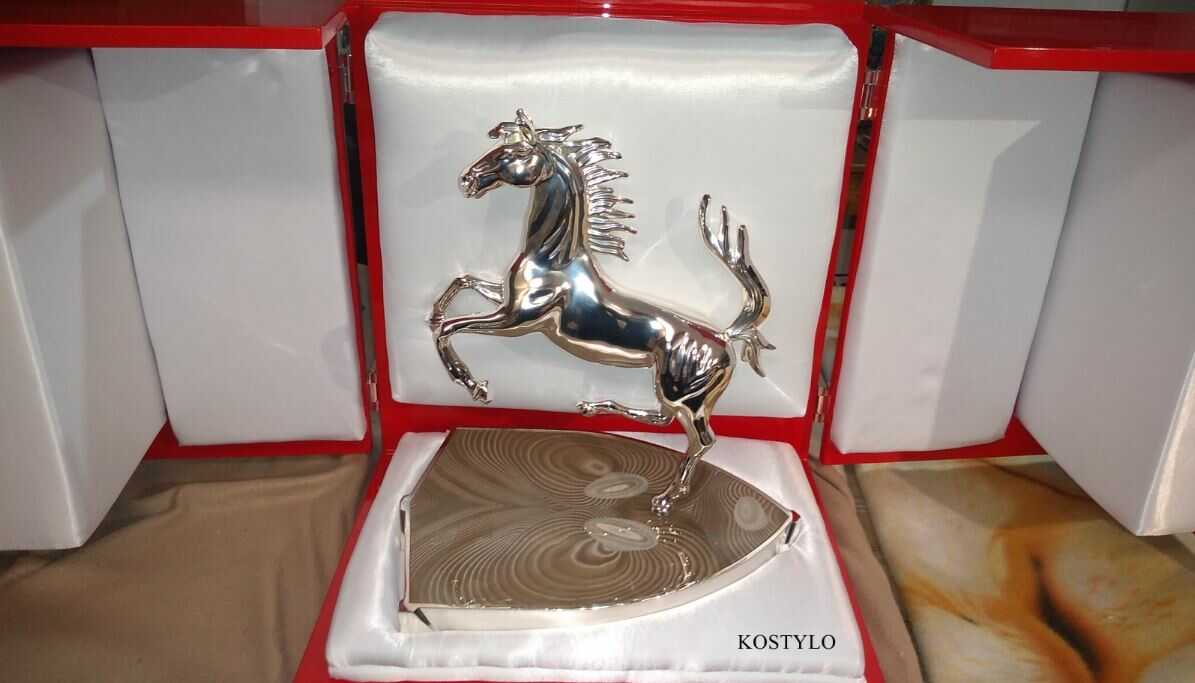 how_we_create_luxury_sculpture_of_ferrari_horse_silver_plated_with_base_featuring_ferrari_logo_and_made_with_rare_high_quality_striped_flint_in_luxury_red_box_handcrafted_at_kostylo the luxury uniquely designed silver-plated sculpture of Ferrari horse along with the base featuring unique pattern of striped flint, in luxurious red box lined with white satin, all handcrafted at the Kostylo atelier