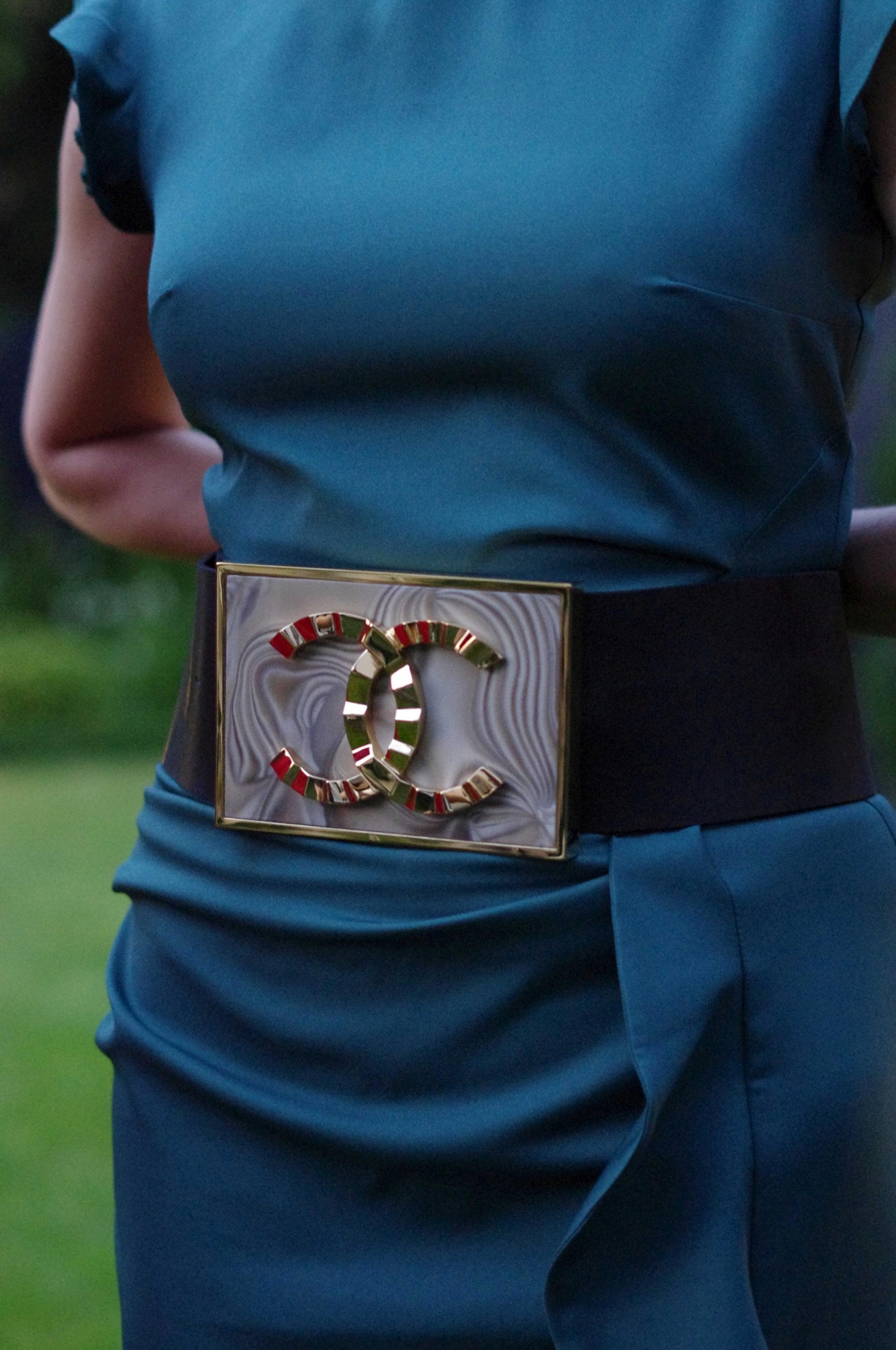 luxurious_belt_buckle_for_dress_butterfly_handmade_goldplated_kostylo luxury uniquely designed gold-plated buckle for dress worn by woman with the Coco Chanel logo, made with the highest quality black leather, handcrafted by atelier Kostylo