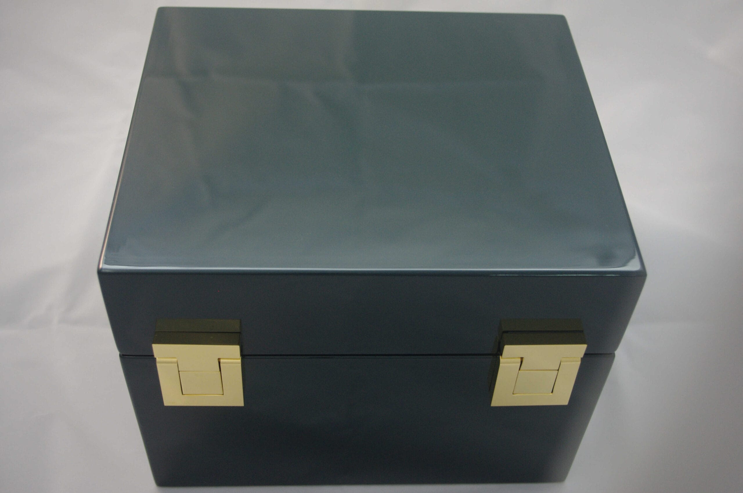 luxurious corporate dark green packaging for our golden luxury box with the heads of arabian horses handcrafted kostylo atelier