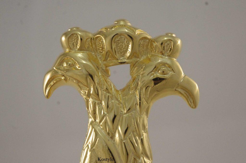 luxury_gold_tsarist_double_headed_imperial_eagle_by_kostylo_atelier Handcrafted high-quality depiction of the head of an imperial eagle in a crown, representing a letter opener designed by kostylo atelier