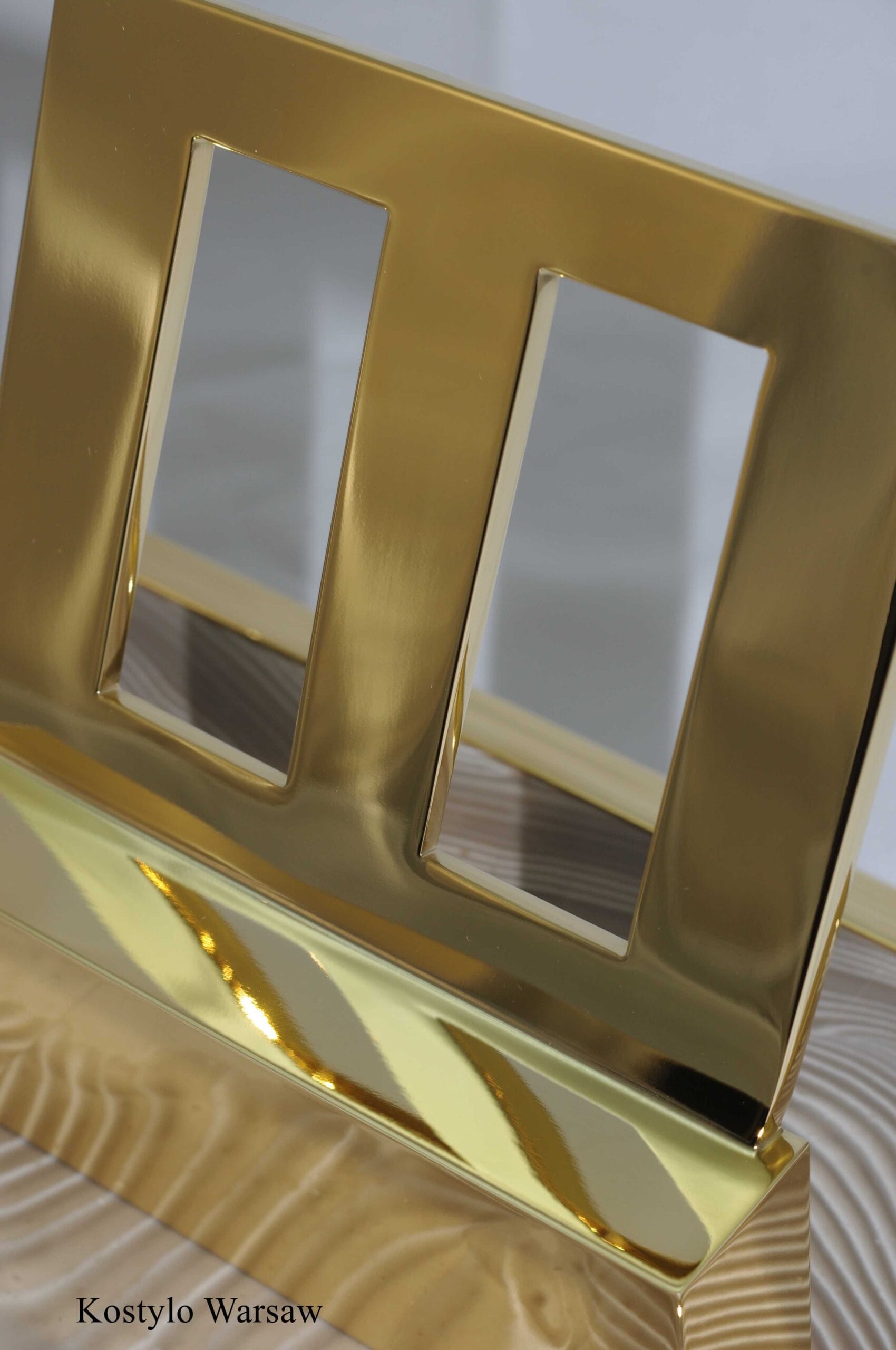 The detail of a luxurious inkwell gilded with 23-karat gold, handcrafted in the Kostylo atelier