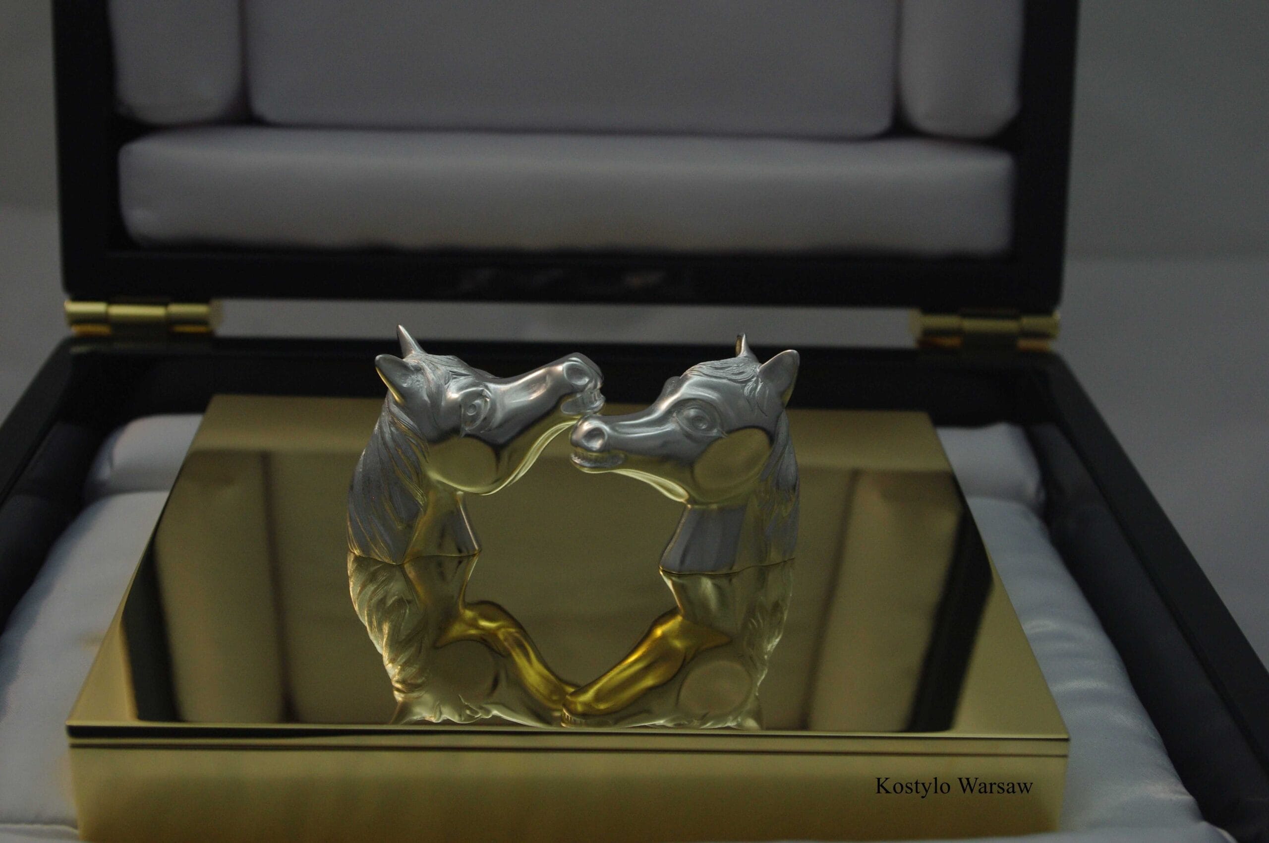 detail of original unique two silver plated arabian horse heads in luxurious dark green packaging handcrafted kostylo atelier