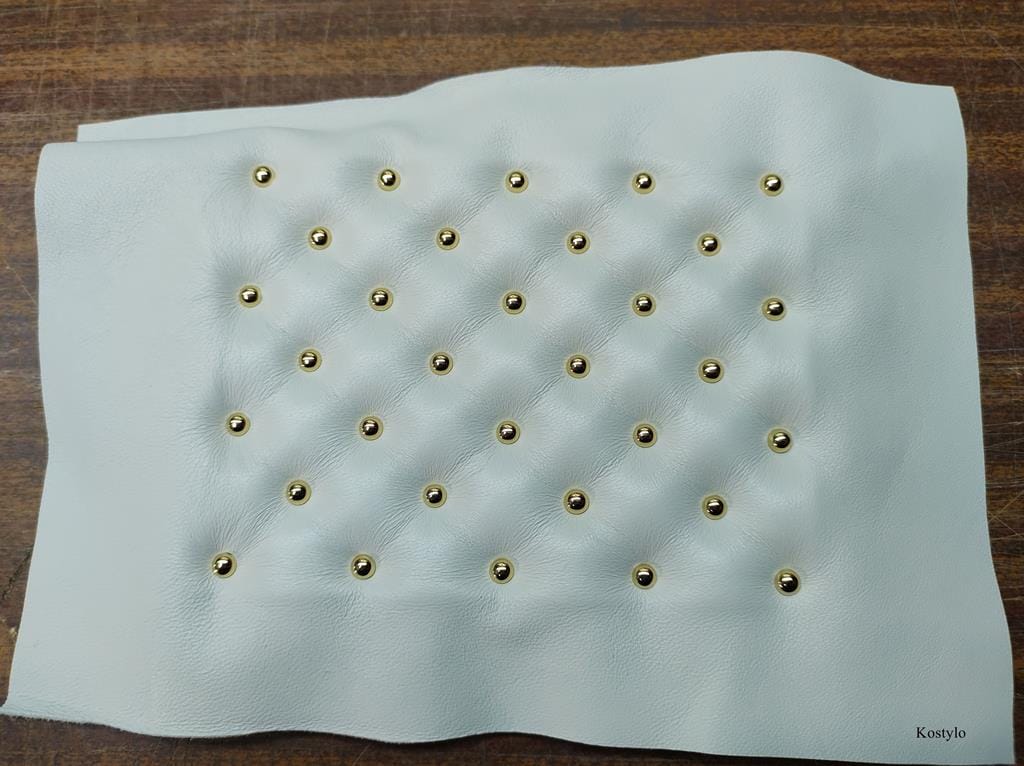 Handcrafted Gold-Plated Brass Upholstery Studs for Luxurious Quilted White Leather by Kostylo The process of handcrafting the interior sidewalls of luxurious gilded jewelry box with gold-quilted natural white leather of the highest quality made at Kostylo atelier