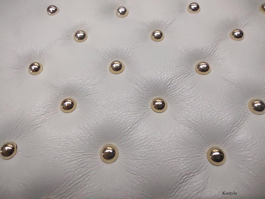 High-Quality Quilted Leather for a Modern Luxurious Box by Kostylo Close-up of luxurious gold-quilted high-quality natural leather handmade by Kostylo atelier