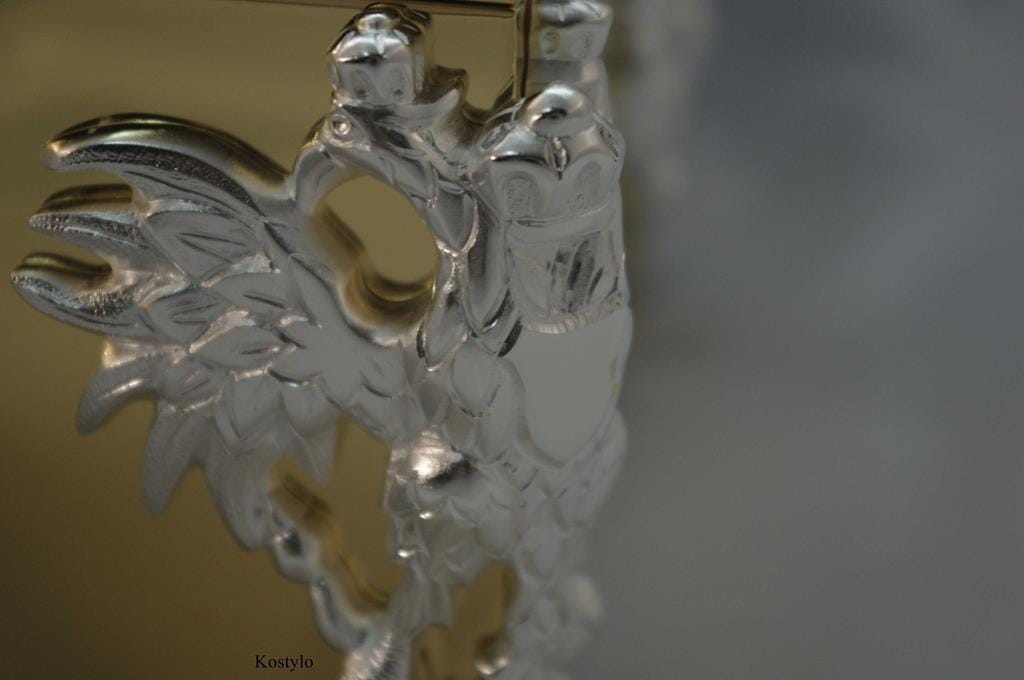 Tsar Double-Headed Eagle Hand-Chiseled by Kostylo Atelier Close-up of the silver-plated Tsar's double-headed eagle figurine detail in luxurious jewelry box with polar bear figurine by Kostylo atelier.